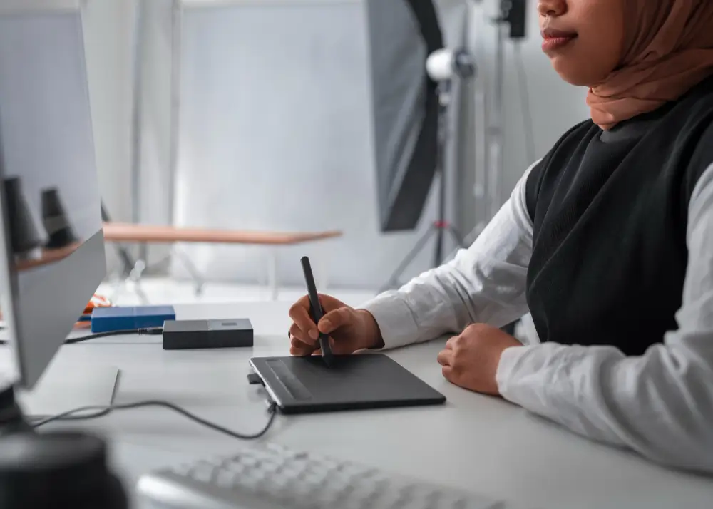 A lady editing a corporate and commercial video